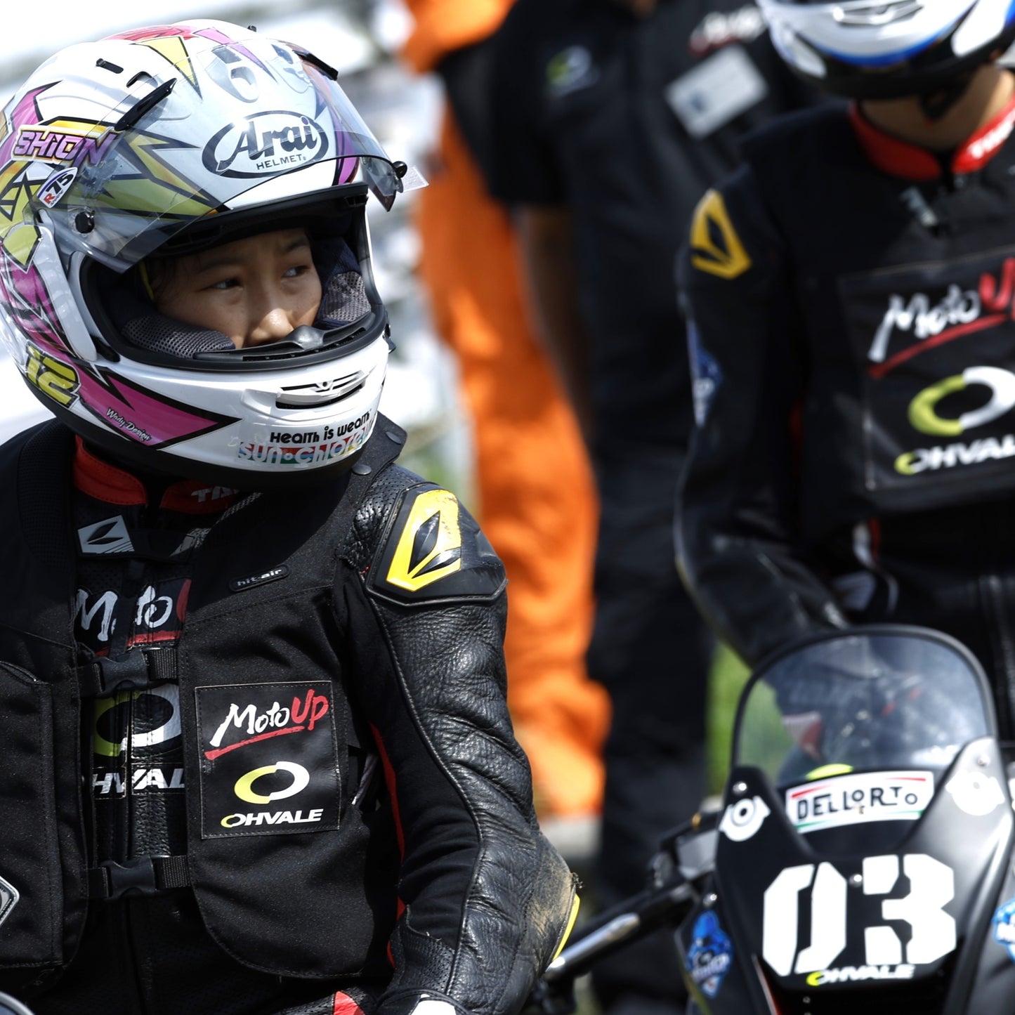 Young rider on a motorcycle equipped with an SKV safety vest